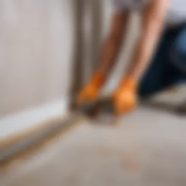 Preparation of a bathroom surface for baseboard installation