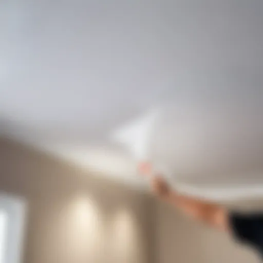 Close-up of adhesive application on a stretch ceiling