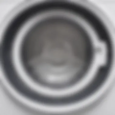 Close-up of a washing machine drum with stains