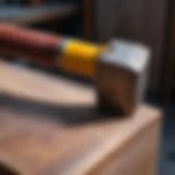 Detailed view of a heavy hammer showcasing its robust build and design.