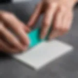 Removing double-sided tape from a smooth surface