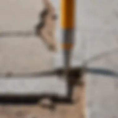 A close-up of a concrete crack being filled with repair material