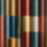 A close-up of various wallpaper rolls in different patterns and colors.