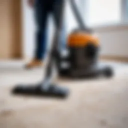 A construction vacuum cleaner in action during a home renovation.