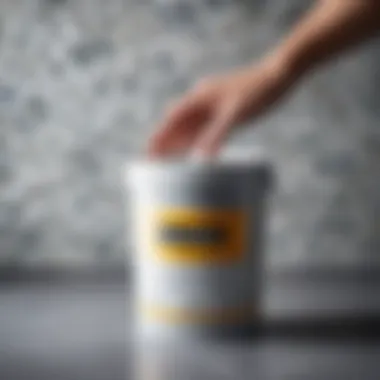Achieving the Perfect Consistency A well-diluted wallpaper adhesive in a container