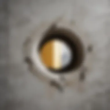 Detailed View of Concrete Damage Close-up of a concrete wall with a hole to be repaired