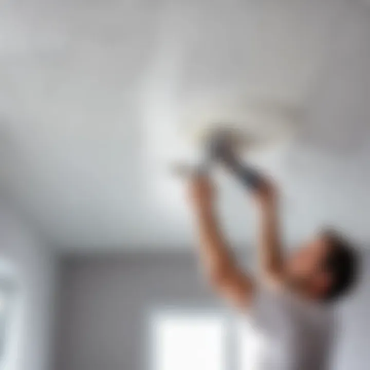 Applying adhesive to foam ceiling