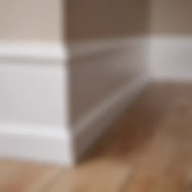 Detailed View of Smoothly Painted Baseboards Close-up of painted baseboards showcasing a smooth finish