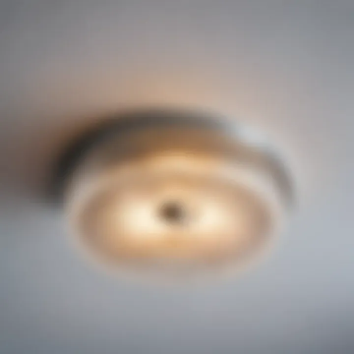 Close-up of a ceiling light fixture removed from a stretch ceiling.