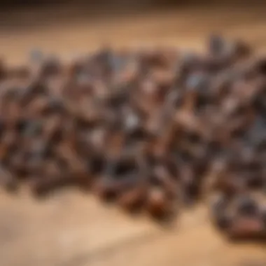 Collection of Rusty Screws An assortment of rust-covered screws on a wooden surface