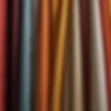 A variety of fabrics suitable for Roman shades, showcasing texture and color options.