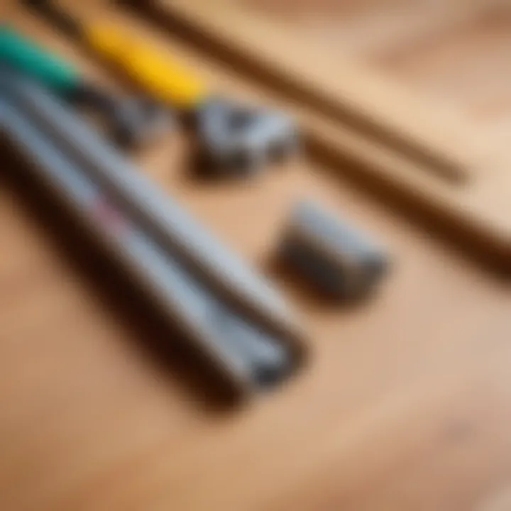 Essential tools for baseboard installation arranged neatly