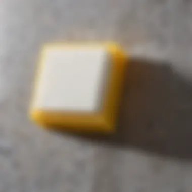 Application of Melamine Sponge on Diverse Surfaces Close-up of melamine sponge in use on various surfaces