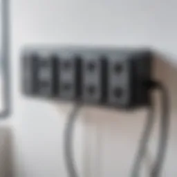 A close-up of a modern surge protector with various outlets and USB ports