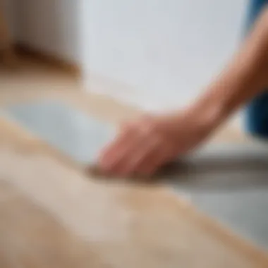 Person carefully applying filler to laminate