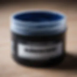 A close-up view of silicone grease in a container, showcasing its smooth texture and glossy appearance.