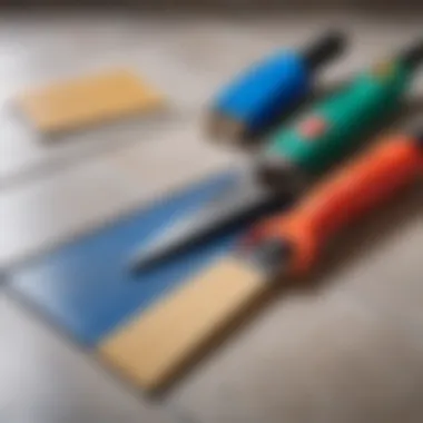 A selection of tools used for tile installation beside different adhesive types.