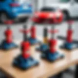 Different types of car jacks displayed on a table