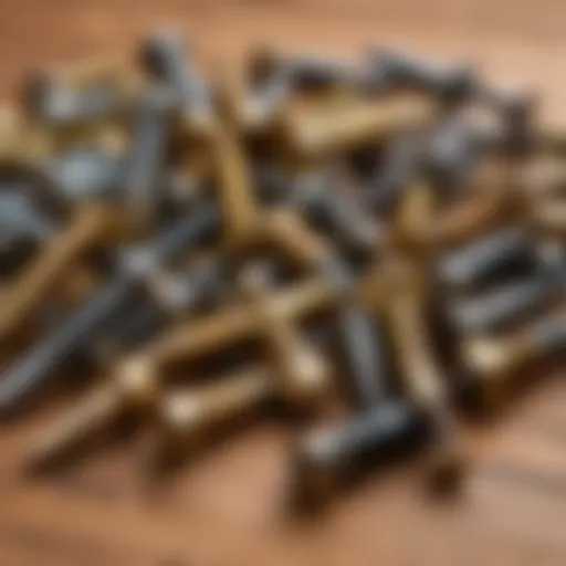 A variety of wood screws displayed on a wooden surface.